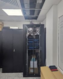 Data cabinet with patched structured cabling